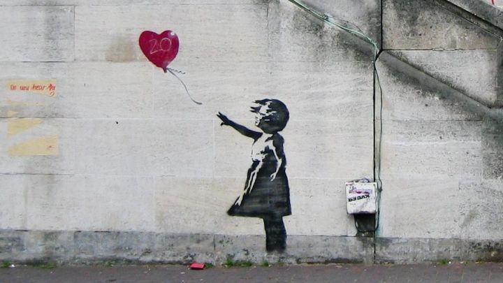 Banksy_Girl_and_Heart_Balloon_2840632113-e1726812622108.jpg